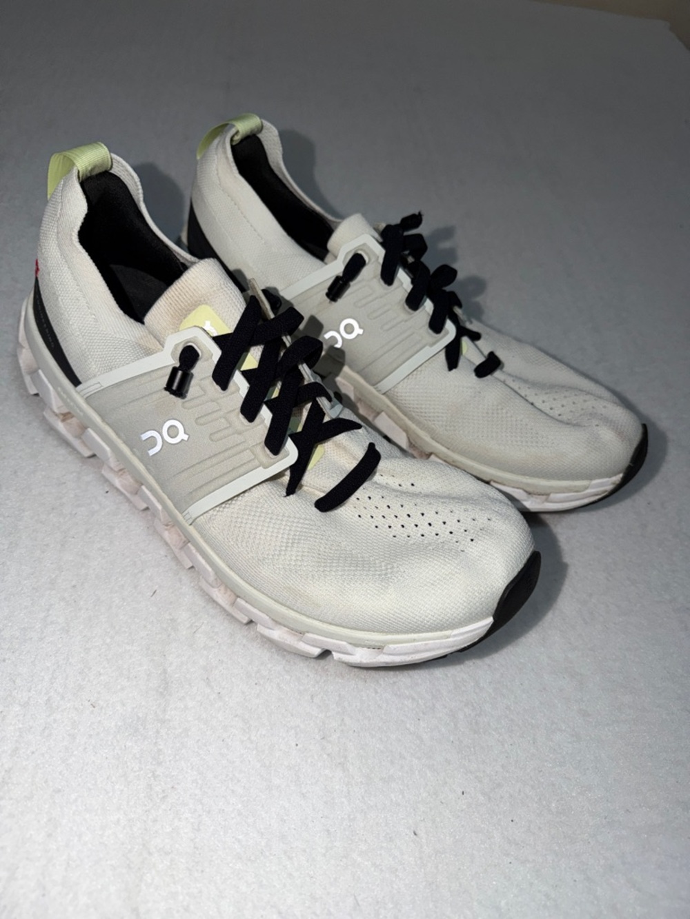 On Cloud Running Shoes in Off-White with Black Laces 10